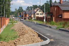 Строительство дорог в поселках